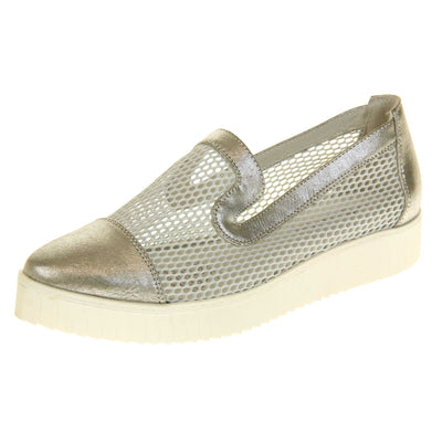 Womens silver loafers. Loafer style shoes with a white net upper and metallic silver toe, heel and collar. White flat chunky platform. Cream insole. Left foot at an angle.