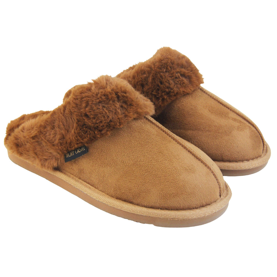 Womens slip on slippers. Mule style slippers with brown faux suede uppers. Brown faux fur lining and collar. Firm brown outsole with grip on the bottom. Both feet together at an angle.
