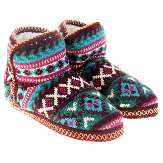 Womens slipper boots. Womens ankle high boot style slippers. Multi coloured knit upper in Aztec pattern. Cream plush faux fur lining. Both feet together at angle.