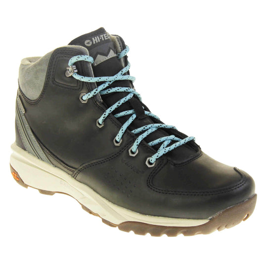 Womens walking boots. Black leather walking boots with grey soles of the side, black soles on the bottom. Deep grip on the base. Pale blue laces to the front with Hi-Tec branding in grey on the tongue. Grey velour padded collar for ankles. Right foot at an angle