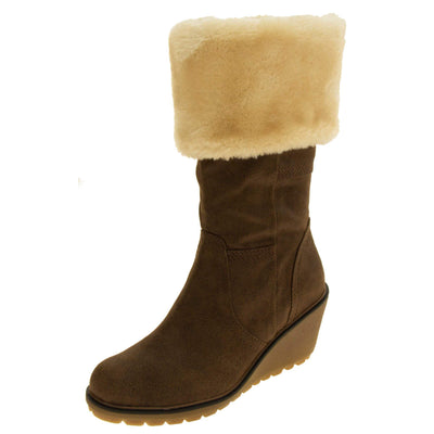 Womens wedge heel boots - tobacco brown vintage suede effect upper with brown stitching, chunky platform wedge heel and cream fur cuff. Left foot at angle.