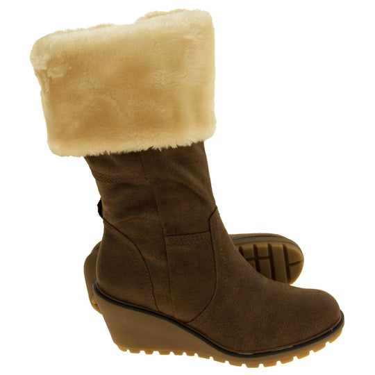 Womens wedge heel boots - tobacco brown vintage suede effect upper with brown stitching, chunky platform wedge heel and cream fur cuff. Both feet with outsole showing.