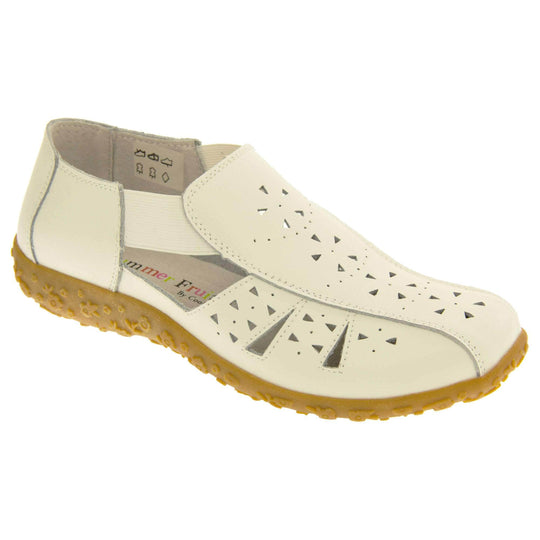 Womens white sandals. White leather closed toe sandals with white stitched detailing. With small cut out details on the upper. White elasticated strips from tongue to ankle to allow more room for a better fit. Cream coloured leather insole and lining. Brown sole with heel having a slight platform with raised flower design for grip. Right foot at an angle.