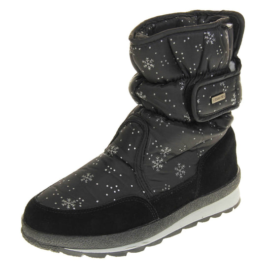Womens Winter Boots. Black textile upper with snowflake and dots pattern on in white. Black faux-suede edging to the bottom of the boot . Grey and white chunky sole with good grip. Faux fur lining. Silver metal Win-Tex tag on the touch fasten strap, Keddo label along outside rim of the foot. Left foot at an angle.